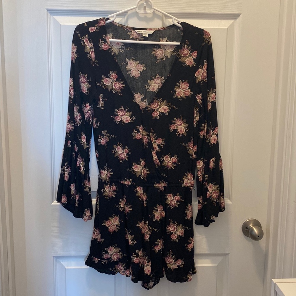 Black floral romper with bell sleeves